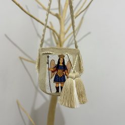 Mochila wayúu con sticker mediana