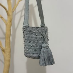 Mochila wayúu con apliques mediana
